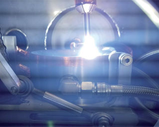 Arcast VersaMelt inert gas atomizer, showing the tilt casting crucible